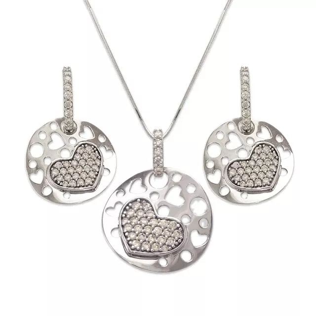 NEW 14K WHITE GOLD FANCY COLLECTION SET EARRINGS PENDANT: NEW 14K WHITE GOLD FANCY COLLECTION SET 14K White Gold Approx. Measurements: Earrings- 17x25mm, Pendant- 20x26mm High Polished/Cubic Zirconia Items in this Set: Earrings, Pendant Chains Sold Separatel