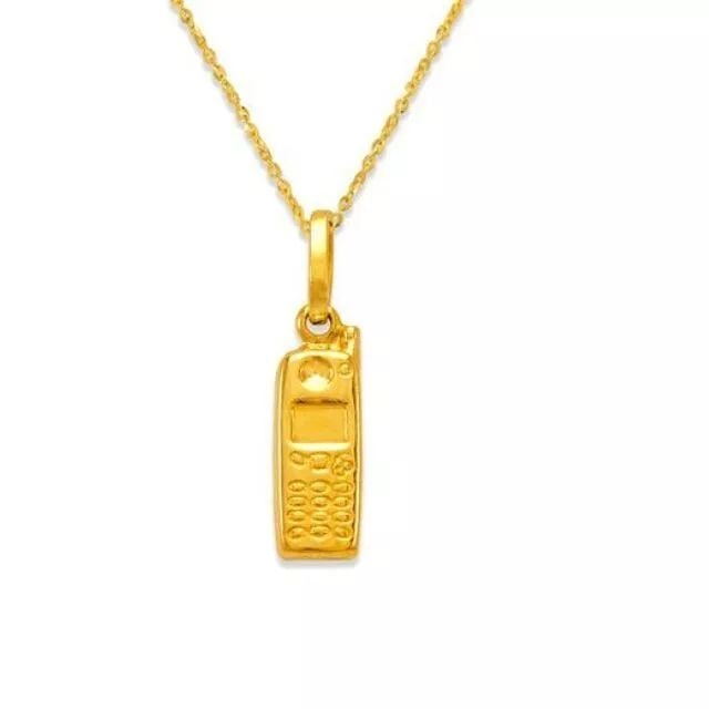 NEW 14K YELLOW GOLD CELL PHONE CHARM PENDANT: NEW 14K YELLOW GOLD CELL PHONE CHARM PENDANT 14K Yellow Gold Approx. 5x15mm Hollow Chains Sold Separately Weight: 0.7 Grams