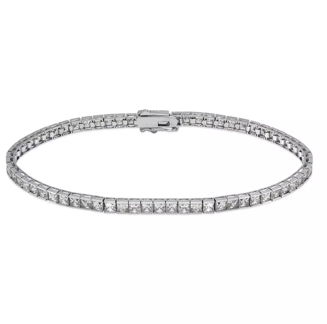 NEW 14K WHITE GOLD CHANNEL SET TENNIS CZ BRACELET 2.5 mm: NEW 14K WHITE GOLD CHANNEL SET TENNIS CZ BRACELET 2.5 mm 14K White Gold Approx. 2.5mm Stone Cubic Zirconia Available in Yellow Gold Box Clasp Length : 7" Inch Weight: 7.1 Grams