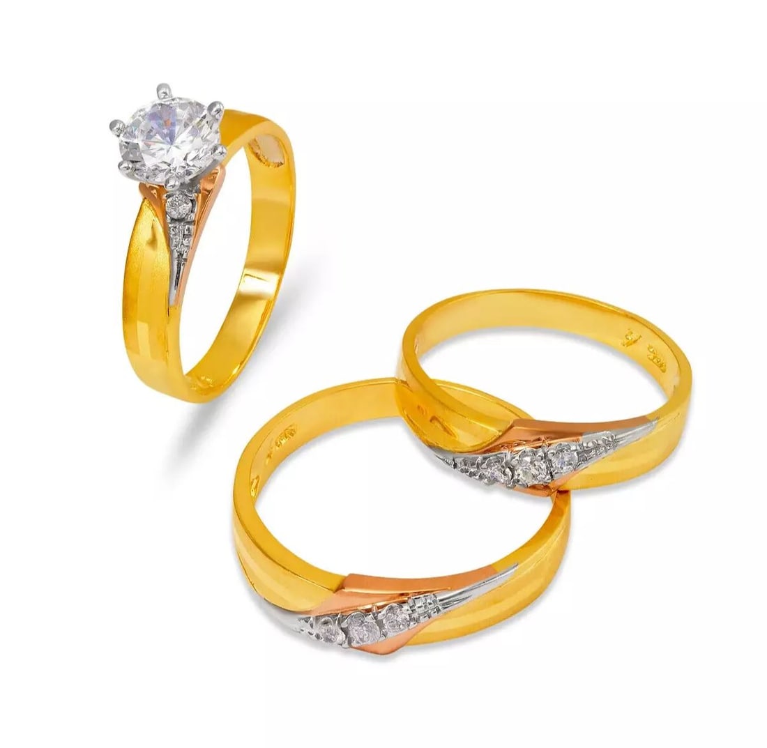 NEW 14K TRI COLOR GOLD WEDDING TRIO RING SET: NEW 14K TRI COLOR GOLD WEDDING TRIO RING SET 14K Tricolor Gold Ladies band and engagement ring is size 7 Men's ring is size 10 Rings Also Sold Separately Available in Yellow and White Gold Weight: 8.4