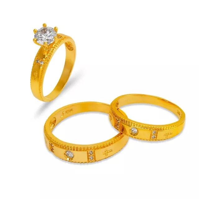 NEW 14K YELLOW GOLD WEDDING TRIO RING SET: NEW 14K YELLOW GOLD WEDDING TRIO RING SET 14K Yellow Gold Ladies band and engagement ring is size 7 Men's ring is size 10 Rings Also Sold Separately Available in Tricolor and White Gold Weight: 7.6 Gr