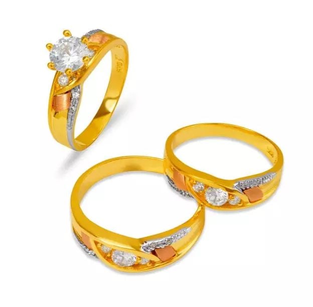 NEW 14K TRI COLOR GOLD WEDDING TRIO RING SET: NEW 14K TRI COLOR GOLD WEDDING TRIO RING SET 14K Tri color Gold Ladies band and engagement ring is size 7 Men's ring is size 10 Rings Also Sold Separately Available in Yellow and White Gold Weight: 9.