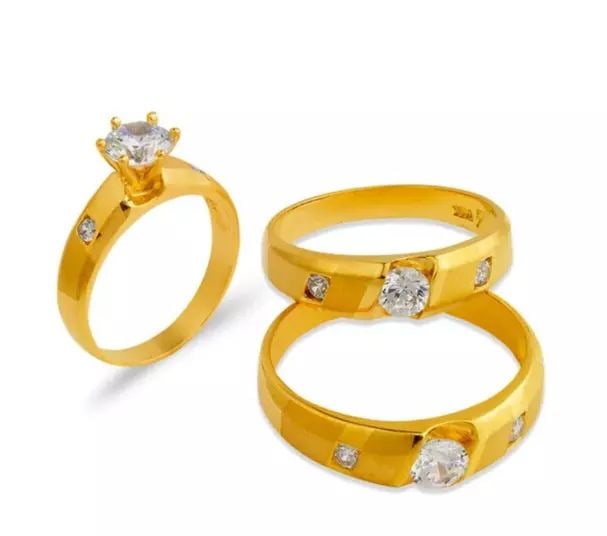 NEW 14K YELLOW GOLD WEDDING TRIO RING SET: NEW 14K YELLOW GOLD WEDDING TRIO RING SET 14K Yellow Gold Ladies band and engagement ring is size 7 Men's ring is size 10 Rings Also Sold Separately Available in White Gold Weight: 9.3 Grams