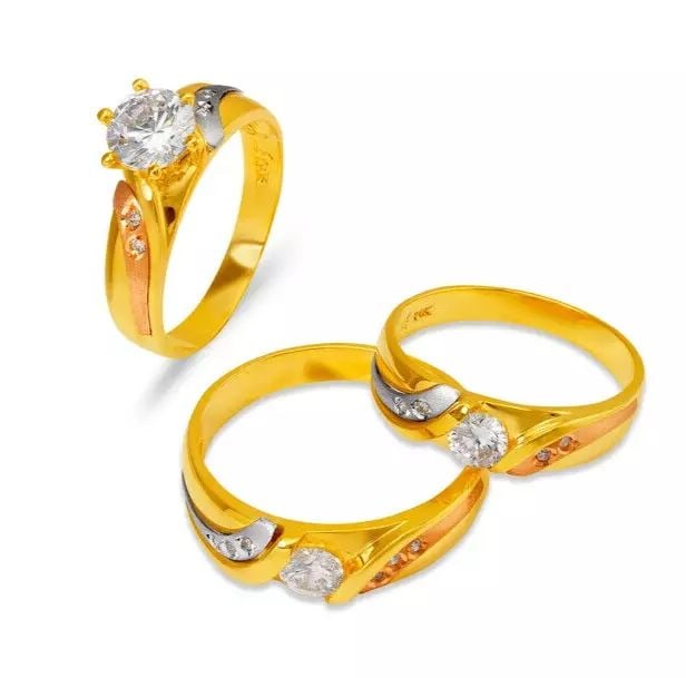 NEW 14K TRI COLOR GOLD WEDDING TRIO RING SET: NEW 14K TRI COLOR GOLD WEDDING TRIO RING SET 14K Tricolor Gold Ladies band and engagement ring is size 7 Men's ring is size 10 Rings Also Sold Separately Available in Yellow and White Gold Weight: 8.8