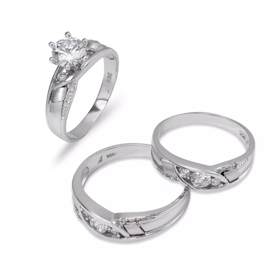 NEW 14K WHITE GOLD WEDDING TRIO RING SET: NEW 14K WHITE GOLD WEDDING TRIO RING SET 14K White Gold Ladies band and engagement ring is size 7 Men's ring is size 10 Rings Also Sold Separately Available in Yellow and Tricolor Gold Weight: 9.4 Gra