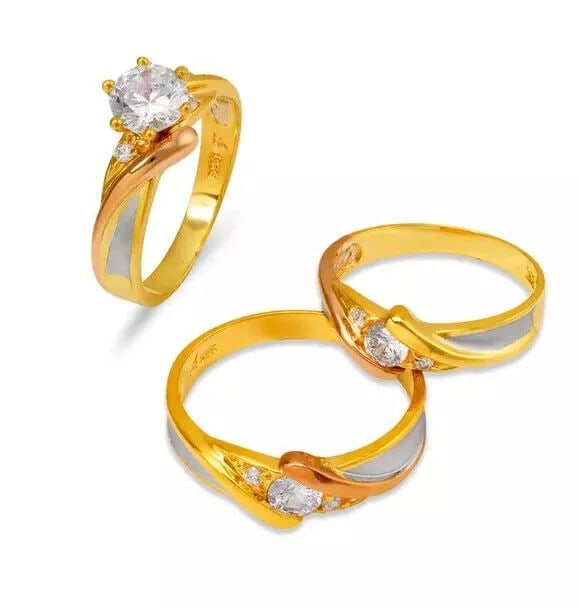 NEW 14K TRI COLOR GOLD WEDDING TRIO RING SET: NEW 14K TRI COLOR GOLD WEDDING TRIO RING SET 14K Tricolor Gold Ladies band and engagement ring is size 7 Men's ring is size 10 Rings Also Sold Separately Available in Yellow and White Gold Weight: 8.4