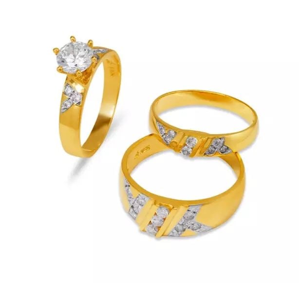 NEW 14K TRI COLOR GOLD WEDDING TRIO RING SET: NEW 14K TRI COLOR GOLD WEDDING TRIO RING SET 14K Tricolor Gold Ladies band and engagement ring is size 7 Men's ring is size 10 Rings Also Sold Separately Weight: 13.1 Grams
