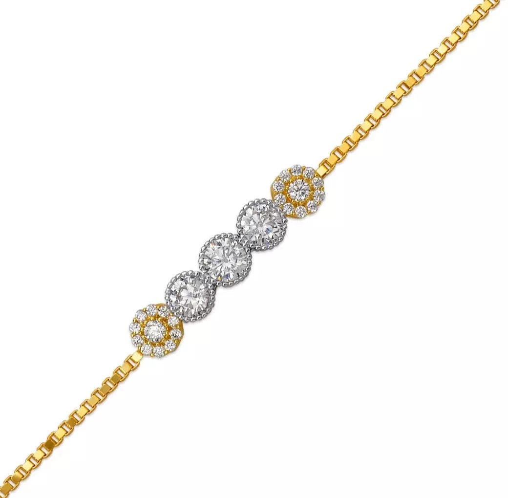 NEW 14K TWO TONE GOLD LADIES HIGH POLISHED CZ BRACELET: NEW 14K TWO TONE GOLD LADIES HIGH POLISHED CZ BRACELET 14K Two Tone Gold Approx. 6.0mm Center, 1.0mm Bracelet High Polished Cubic Zirconia Lobster Lock Length : 7" Inch Weight: 4.2 Grams