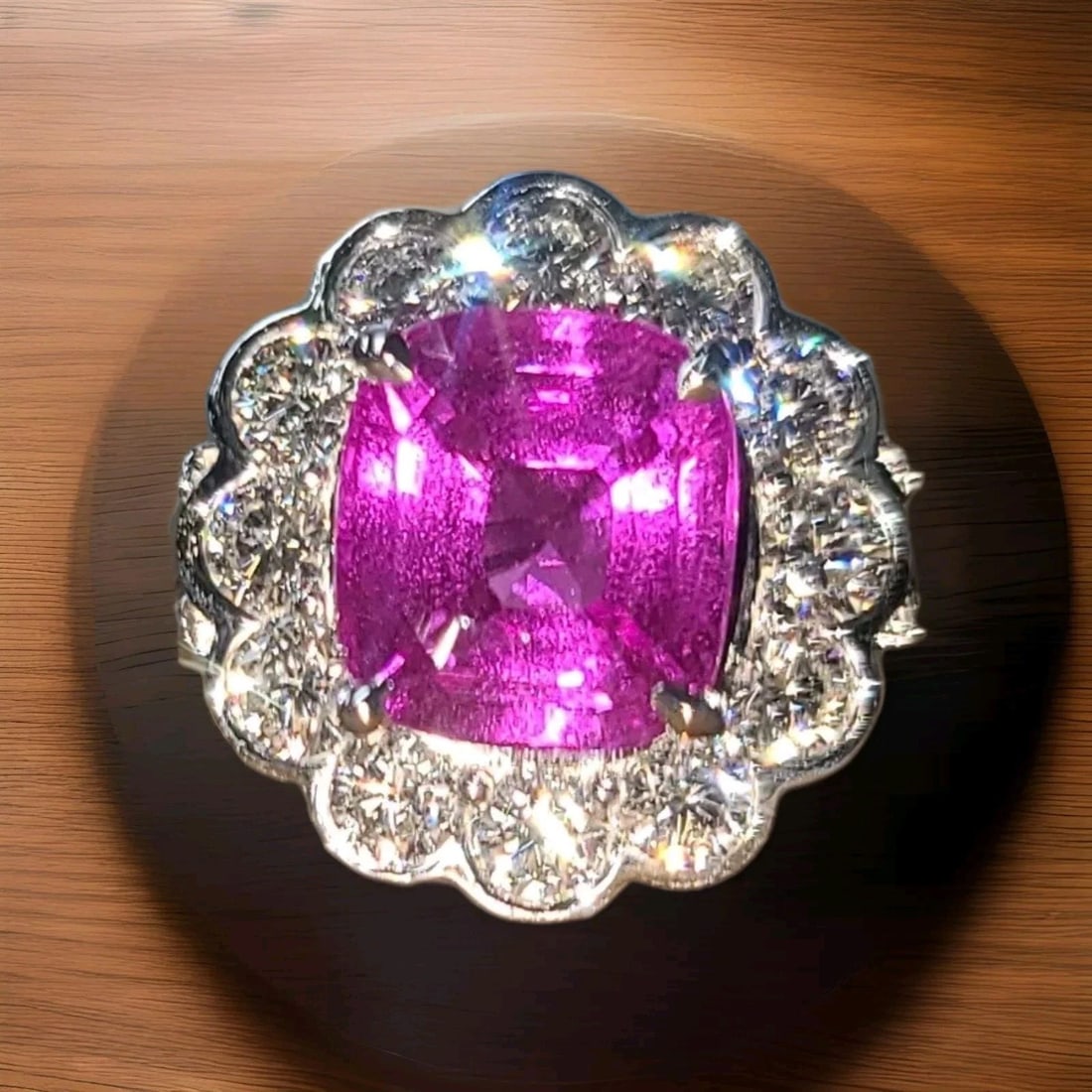 VINTAGE PLATINUM ENGAGEMENT RING 5.04CT. NATURAL PINK SAPPHIRE CUSHION CUT GIA: VINTAGE PLATINUM ENGAGEMENT RING 5.04CT. NATURAL PINK SAPPHIRE CUSHION CUT GIA This vintage platinum engagement ring features a stunning natural pink sapphire cushion cut stone with a total carat weig