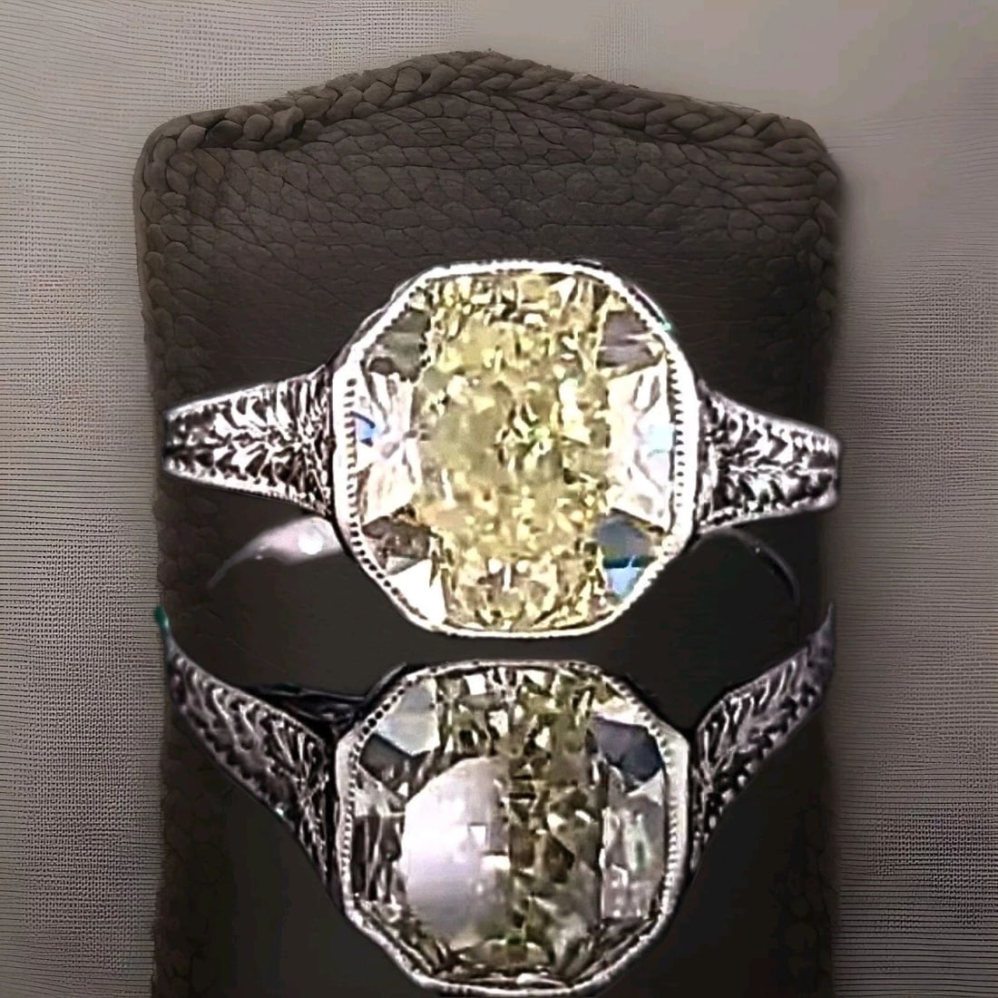 PLATINUM VINTAGE ENGAGEMENT RING 3.16CT.NATURAL YELLOW CUSHION DIAMOND GIA CERT: PLATINUM VINTAGE ENGAGEMENT RING 3.16CT.NATURAL YELLOW CUSHION DIAMOND GIA CERT The stunning 3.16ct yellow cushion yellow diamond ring is the epitome of vintage elegance. Crafted in platinum, this Art