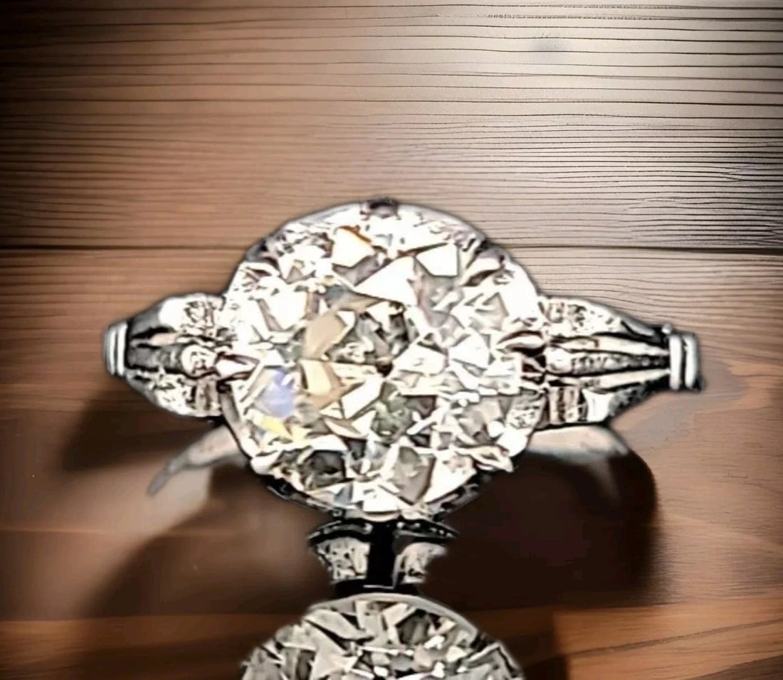 2.25CT. PLATINUM VINTAGE FILIGREE ENGAGEMENT RING NATURAL EURO OLD CUT DIAMOND: 2.25CT. PLATINUM VINTAGE FILIGREE ENGAGEMENT RING NATURAL EURO OLD CUT DIAMOND Gorgeous art deco filigree Platinum Engagement ring circ 1920's center natural euro cut round Diamond weight 2.25ct.SIZE