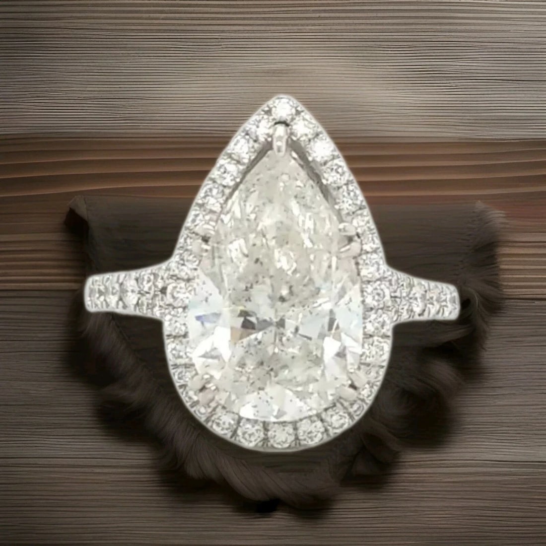 VINTAGE 18K WHITE GOLD ENGAGEMENT RING 4.23CT. NATURAL PEAR SHAPE DIAMOND: 18K WHITE GOLD NATURAL PEAR DIAMOND ENGAGEMENT RING 4.23CT I1-H GORGEOUS 18k white gold diamond engagement ring center pear shape natural clarity enhanced diamond weight 4.23ct Size 14.5x8.7mm I1-H CO