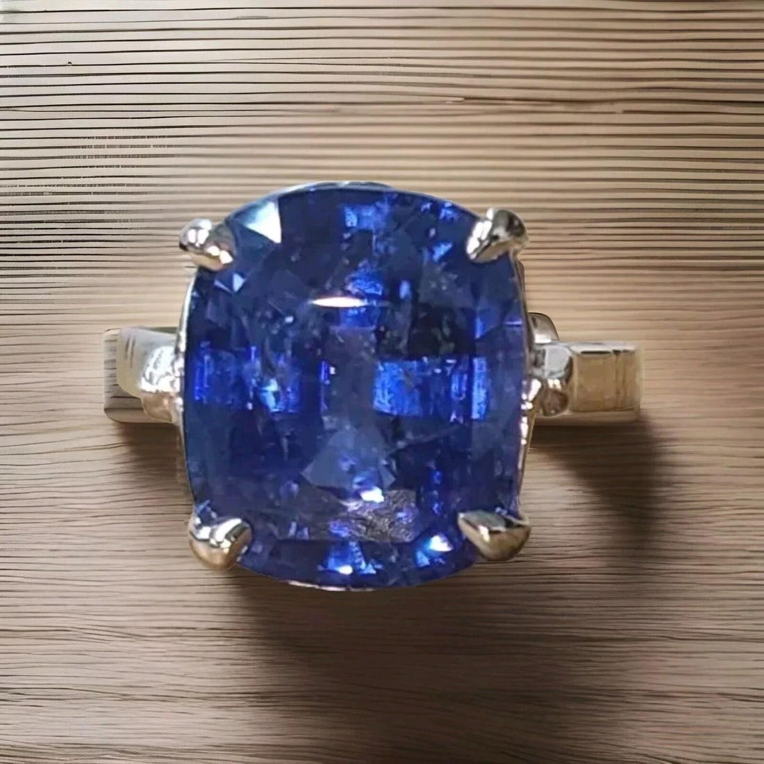 VINTAGE 14K WHITE GOLD ENGAGEMENT RING 10.41CT. NATURAL BLUE CUSHION SHAPE GIA: VINTAGE 14K WHITE GOLD ENGAGEMENT RING 10.41CT. NATURAL BLUE CUSHION SHAPE GIA This vintage engagement ring is a true beauty. Crafted from 14K white gold, it features a stunning natural blue cushion-s