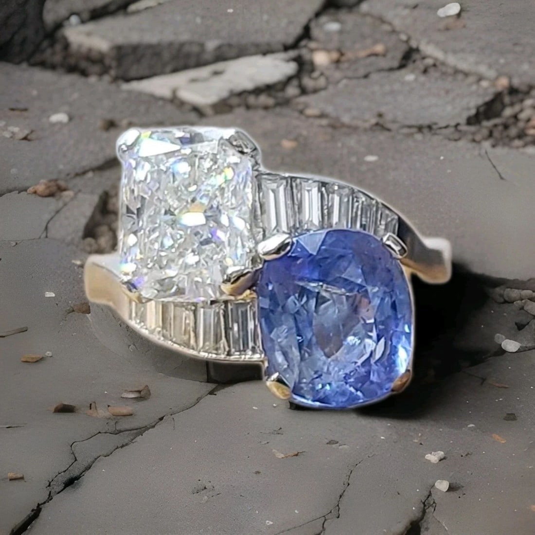VINTAGE PLATINUM ENGAGEMENT RING 6.16CT.NATURAL BLUE SAPPHIRE CUSHION DIAMOND: VINTAGE PLATINUM ENGAGEMENT RING 6.16CT.NATURAL BLUE SAPPHIRE CUSHION DIAMOND The Vintage Platinum Engagement Ring is a stunning piece featuring a 6.16CT total weight natural blue sapphire as the main
