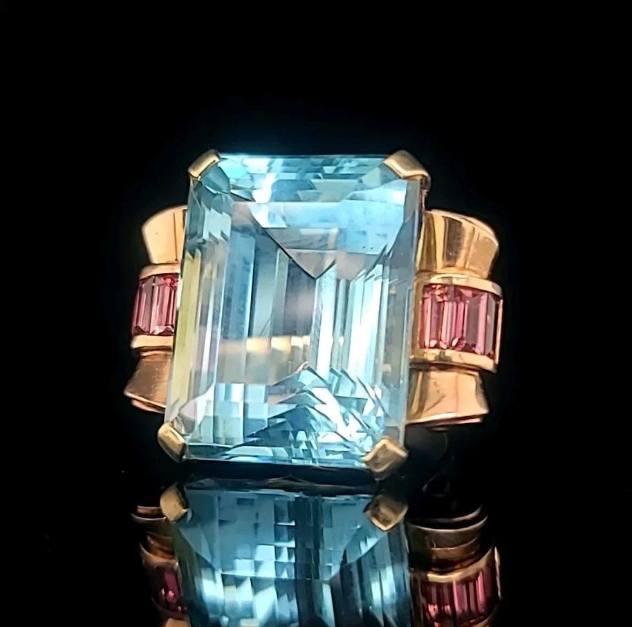 VINTAGE 14K ROSE GOLD RING 52.22.CT. NATURAL SKY BLUE AQUAMARINE CIRC 1900'S: VINTAGE 14K ROSE GOLD RING 52.22.CT. NATURAL SKY BLUE AQUAMARINE CIRC 1900'S STUNNING ANTIQUE 14K ROSE GOLD RING NATURAL GEM SKY BLUE AQUAMARINE IN EMERALD SHAPE CENTER 52.22CARAT NATURAL AQUAMARINE S