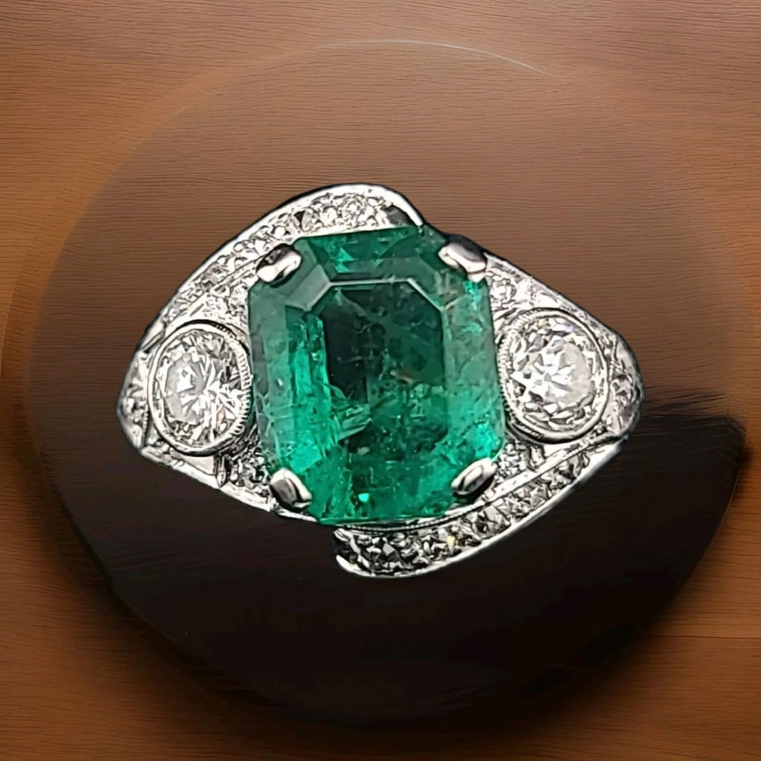 PLATINUM VINTAGE ART DECO 4.43CT. NATURAL COLOMBIA EMERALD DIAMOND RING 1920'S: 4.43CT. PLATINUM VINTAGE ART DECO NATURAL EMERALD DIAMOND RING CIRC 1920'S Gorgeous Vintage Diamond & Emerald in Platinum ring circ 1920's center set natural Colombia emerald weight 4.43ct size 11.1x9