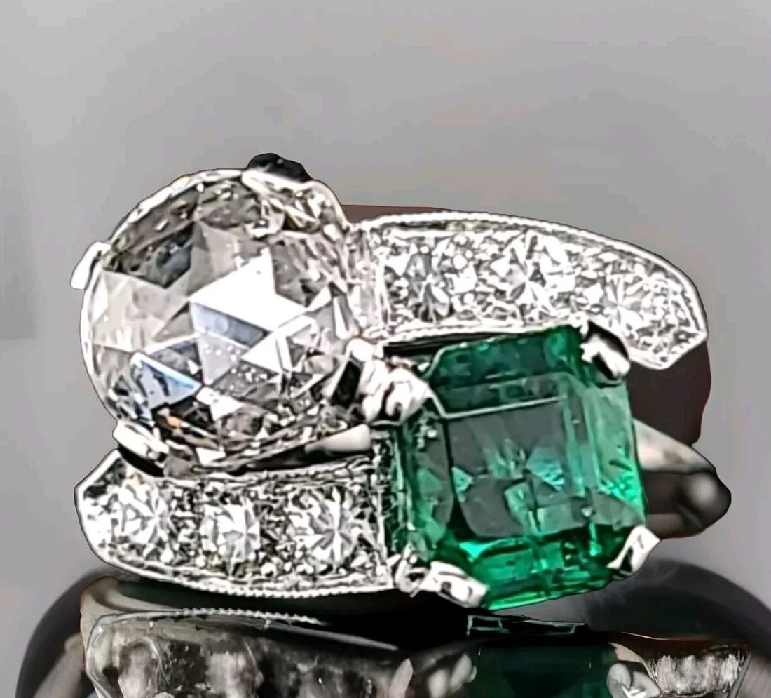 2.16CT. PLATINUM VINTAGE ART DECO NATURAL EMERALD DIAMOND TOI ET MOI RING: 2.16CT. PLATINUM VINTAGE ART DECO NATURAL EMERALD DIAMOND TOI ET MOI RING Gorgeous Vintage artdeco filigree Diamond & Emerald in Platinum toi et moi ring circ 1920's center set natural round rose cut