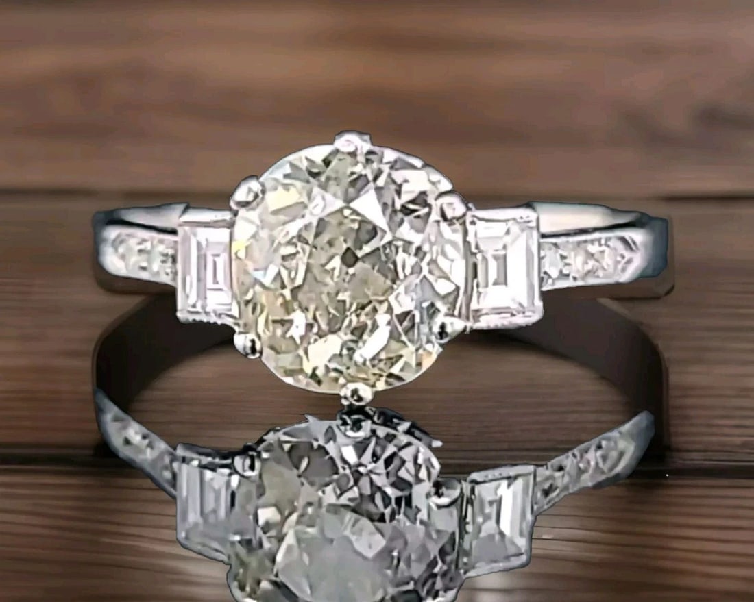 PLATINUM VINTAGE ENGAGEMENT RING 1.52CT. NATURAL OLD EURO CUT ROUND DIAMOND: PLATINUM VINTAGE ENGAGEMENT RING 1.52CT. NATURAL OLD EURO CUT ROUND DIAMOND This vintage engagement ring is a stunning piece of jewelry that will make any woman feel special. The ring features a 1.52c