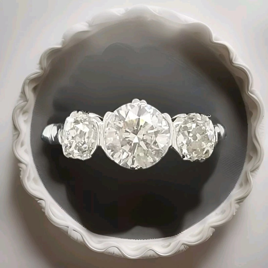 VINTAGE PLATINUM THREE-STONE ENGAGEMENT RING 1.85CT. OLD EURO CUT DIAMOND: 1.85CT VINTAGE PLATINUM THREE STONE ENGAGEMENT RING OLD EURO CUT DIAMOND Here is an outstanding platinum diamond engagement vintage ring,the beautiful three stone diamond design gives this ring amazin