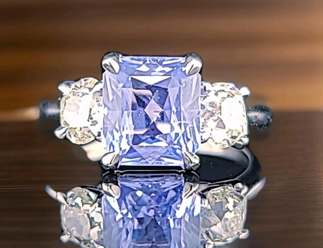 VINTAGE PLATINUM ENGAGEMENT RING 2.53CT.NATURAL UNTREATED BLUE SAPPHIRE RADIANT: VINTAGE PLATINUM ENGAGEMENT RING 2.53CT.NATURAL UNTREATED BLUE SAPPHIRE RADIANT This Vintage Platinum Engagement Ring features a stunning 2.53CT Natural Untreated Blue Radiant Sapphire as the main sto