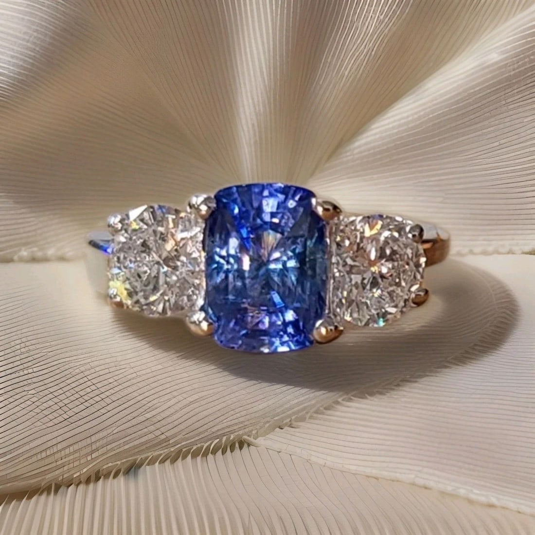 14K WHITE GOLD ENGAGEMENT RING 2.54CT. NATURAL UNTREATED BLUE SAPPHIRE CUSHION: 14K WHITE GOLD ENGAGEMENT RING 2.54CT. NATURAL UNTREATED BLUE SAPPHIRE CUSHION This 14K White gold Engagement Ring features a stunning 2.54ct natural untreated blue sapphire in a cushion shape, making