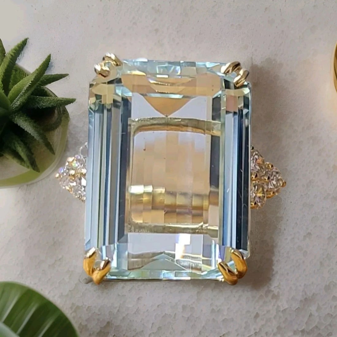 VINTAGE 14K YELLOW ENGAGEMENT RING 25.44CT.NATURAL AQUAMARINE EMERALD SHAPE: VINTAGE 14K YELLOW ENGAGEMENT RING 25.44CT.NATURAL AQUAMARINE EMERALD SHAPE This vintage 14k yellow engagement ring features a beautiful natural aquamarine gemstone with an emerald shape and a total w