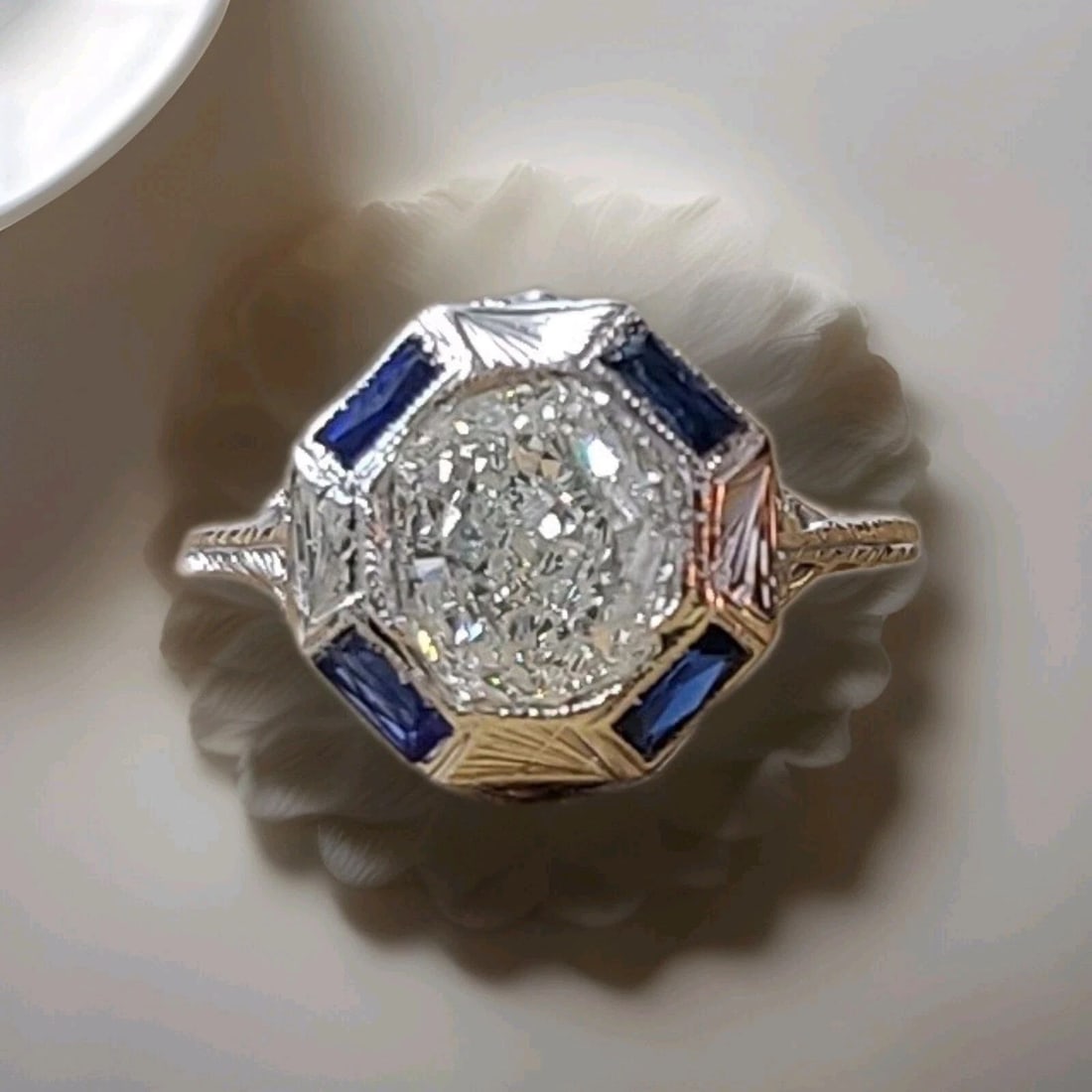 18K WHITE GOLD FILIGREE ENGAGEMENT RING 1.02CT.NATURAL OLD EURO OVAL DIAMOND: 18K WHITE GOLD FILIGREE ENGAGEMENT RING 1.02CT.NATURAL OLD EURO OVAL DIAMOND This stunning 18k white gold ring is the perfect symbol of your eternal love. The ring features a natural old Euro oval dia