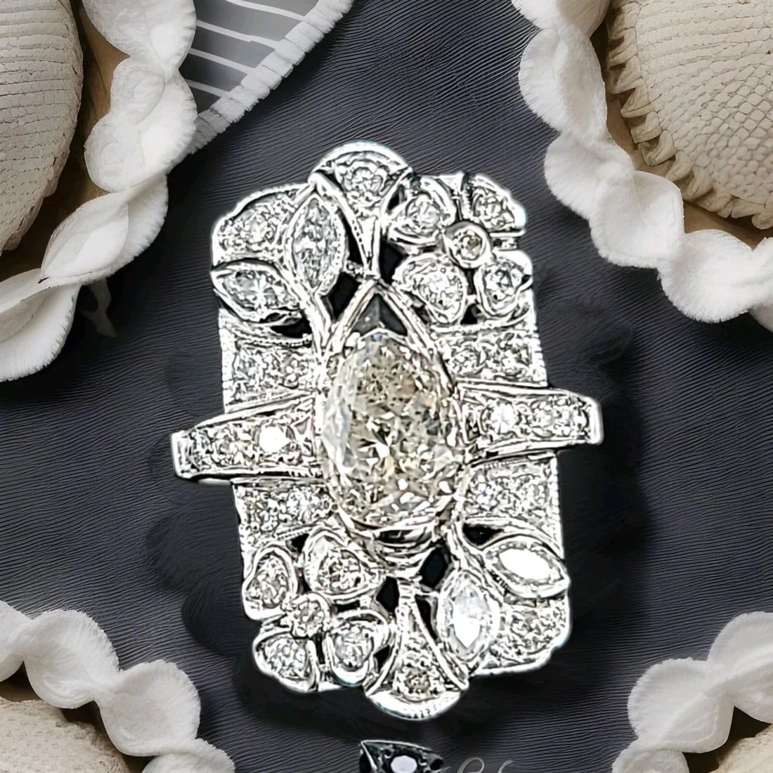 PLATINUM VINTAGE FILIGREE RING 1.56CT.NATURAL OLD MINE PEAR DIAMOND 1930'S: Gorgeous Vintage art deco filigree Diamond in a platinum ring.circ 1930's set center natural old mine pear shape weight 1.56ct. Size 9.2x6.2mm very brilliant, sparkly, very lively stones, nice cut.I2