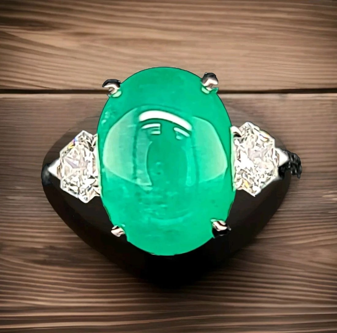 VINTAGE 14K WHITE GOLD ENGAGEMENT RING 7.15CT.NATURAL GREEN COLOMBIA EMERALD: VINTAGE 14K WHITE GOLD ENGAGEMENT RING 7.15CT.NATURAL GREEN COLOMBIA EMERALD This vintage 14k white gold engagement ring is a true masterpiece. The oval-shaped natural green Colombian emerald, with a