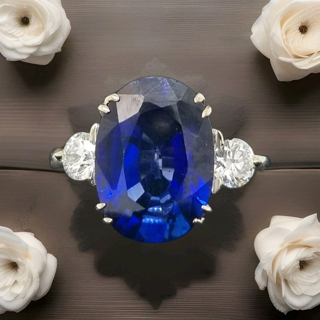 VINTAGE 14K WHITE GOLD ENGAGEMENT RING 7.05CT. GEM BLUE SAPPHIRE OVAL SHAPE: VINTAGE 14K WHITE GOLD ENGAGEMENT RING 7.05CT. GEM BLUE SAPPHIRE OVAL SHAPE GORGEOUS 14k white gold blue sapphire in an oval shape Center lab-grown sapphire weight 7.05ct. size 14x10mm very nice rich