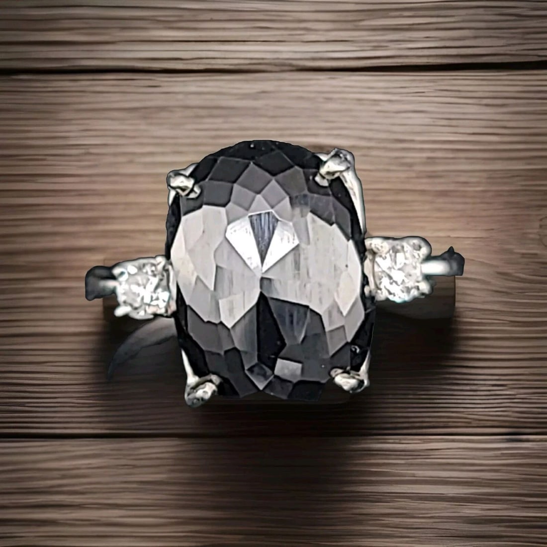 14K WHITE GOLD ENGAGEMENT RING 9.55CT. BLACK DIAMOND OVAL SHAPE: 14K WHITE GOLD ENGAGEMENT RING 9.55CT. BLACK DIAMOND OVAL SHAPE Gorgeous 14k white gold naturally treated irradiated black diamond engagement ring center natural black diamond in oval shape checkerboa