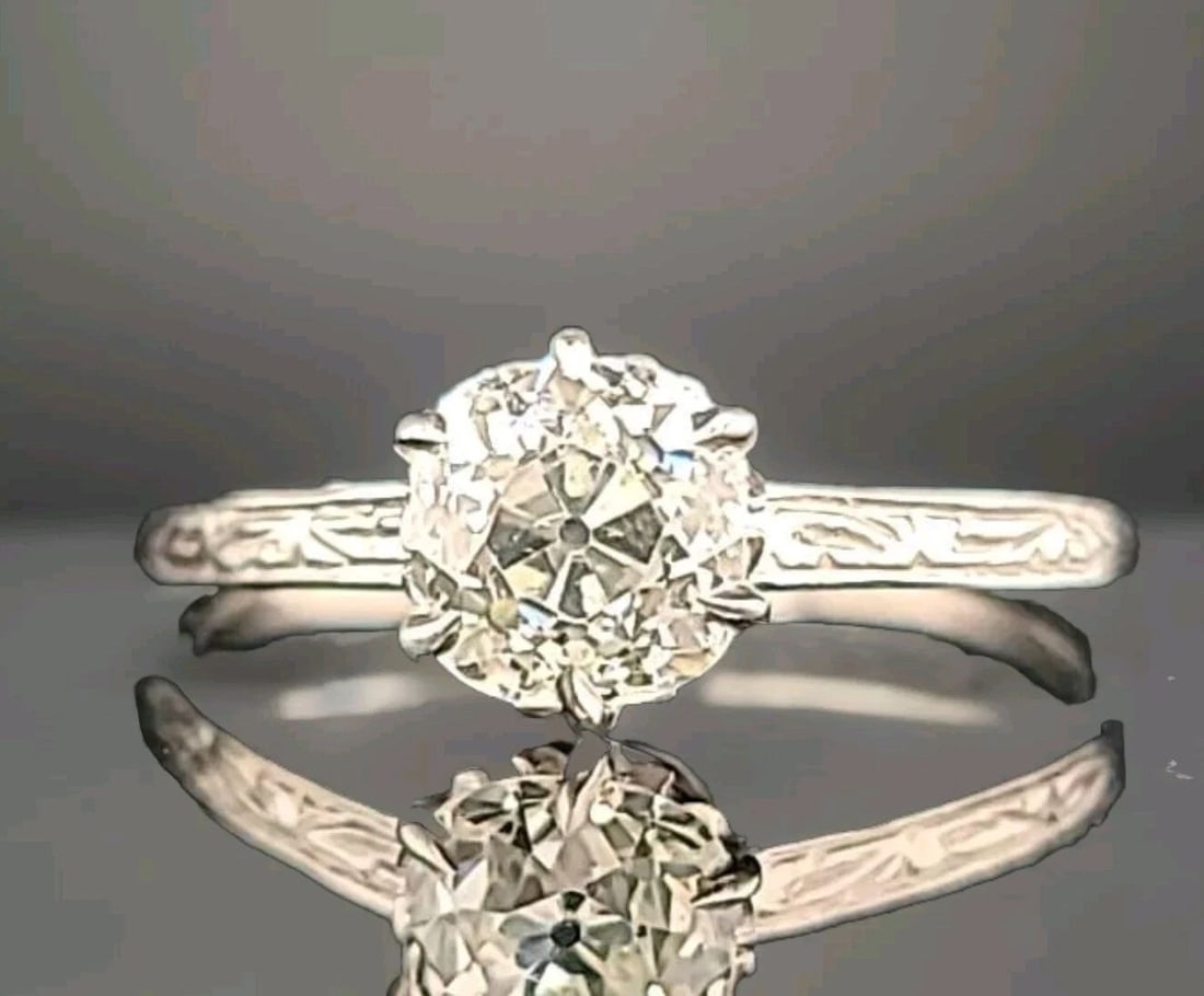 1.11CT. PLATINUM ART DECO FILIGREE ENGAGEMENT RING NATURAL OLD MINE CUT DIAMOND: 1.11CT. PLATINUM ART DECO FILIGREE ENGAGEMENT RING NATURAL OLD MINE CUT DIAMOND This stunning engagement ring features a natural Old Mine Cut Diamond set in platinum filigree. The solitaire style is a