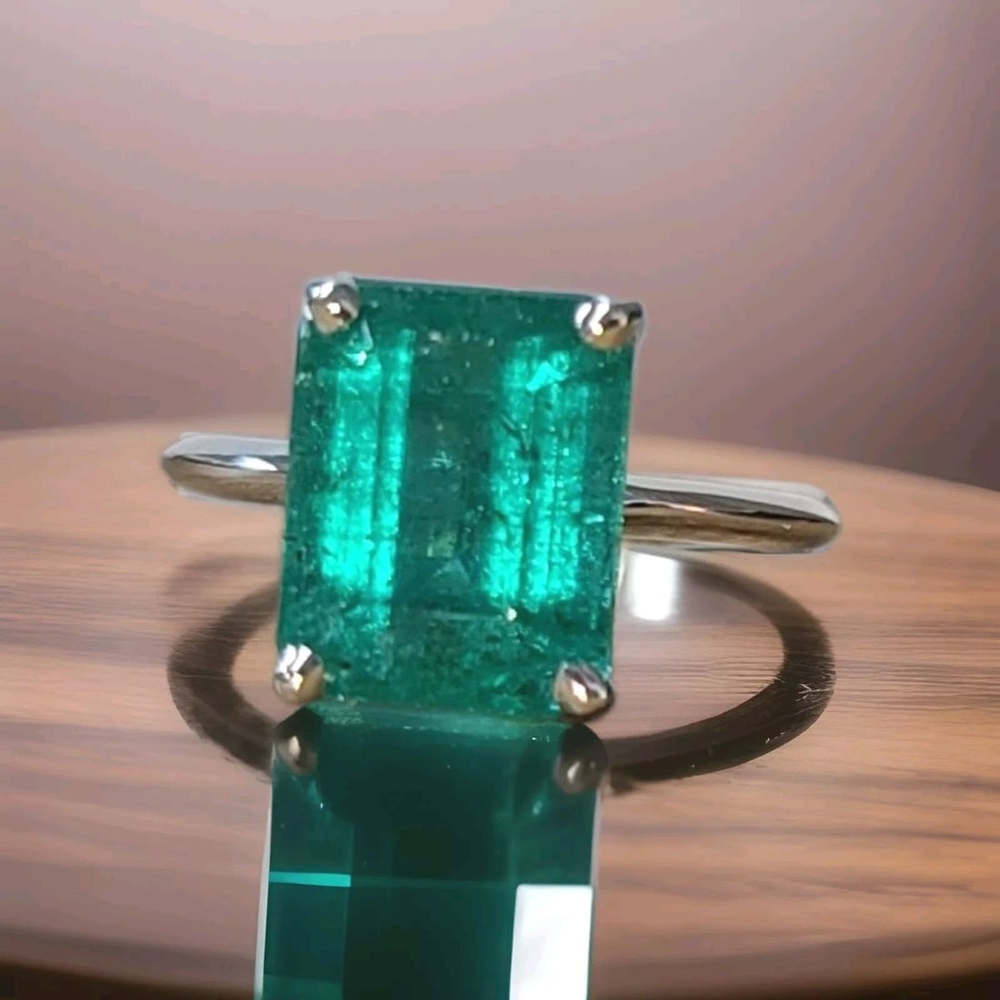14K WHITE GOLD VINTAGE ENGAGEMENT RING 5.75CT NATURAL GREEN EMERALD RECTANGULAR: 14K WHITE GOLD VINTAGE ENGAGEMENT RING 5.75CT NATURAL GREEN EMERALD RECTANGULAR This vintage 14k White Gold Vintage Engagement Ring features a stunning 5.75ct size 11.1x8.9mm natural green emerald in