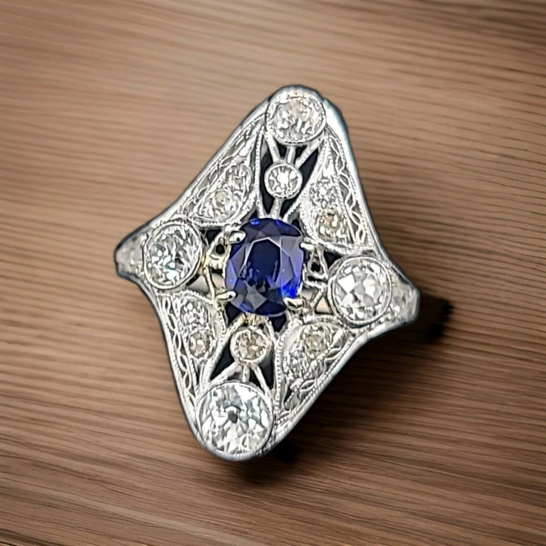 VINTAGE PLATINUM FILIGREE RING 1.59CT. NATURAL BLUE SAPPHIRE OVAL SHAPE: VINTAGE PLATINUM FILIGREE RING 1.59CT. NATURAL BLUE SAPPHIRE OVAL SHAPE Gorgeous Vintage art deco filigree Platinum ring blue sapphire in oval shape circ 1920s center natural sapphire weight 0.84ct. S