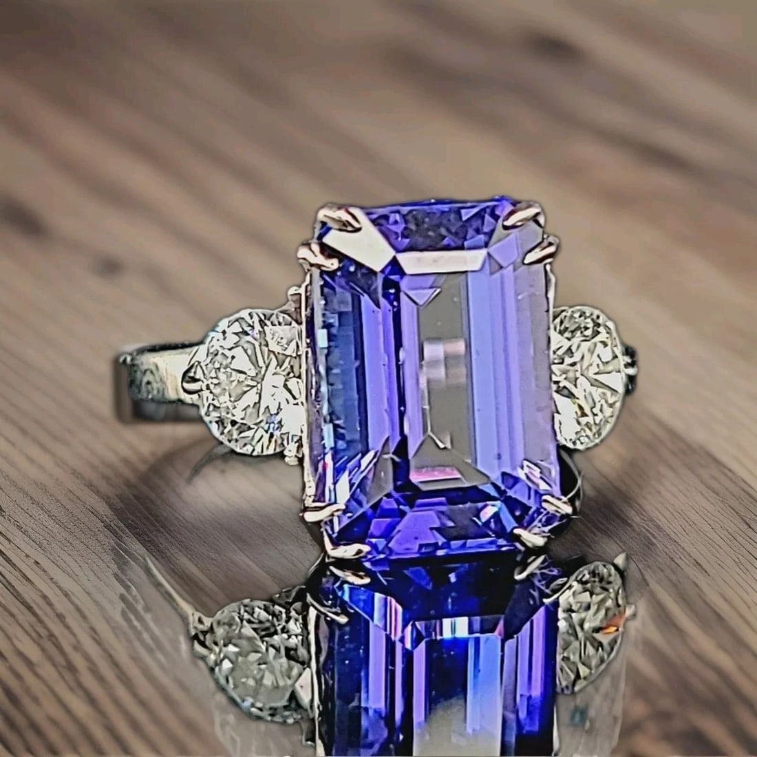 14K WHITE GOLD ENGAGEMENT RING 6.32CT.NATURAL TANZANITE EMERALD SHAPE: 14K WHITE GOLD ENGAGEMENT RING 6.32CT.NATURAL TANZANITE EMERALD SHAPE GORGEOUS 14k white gold engagement ring tanzanite in emerald shape Center natural tanzanite in emerald weight 6.32ct. Size 13x8.6m