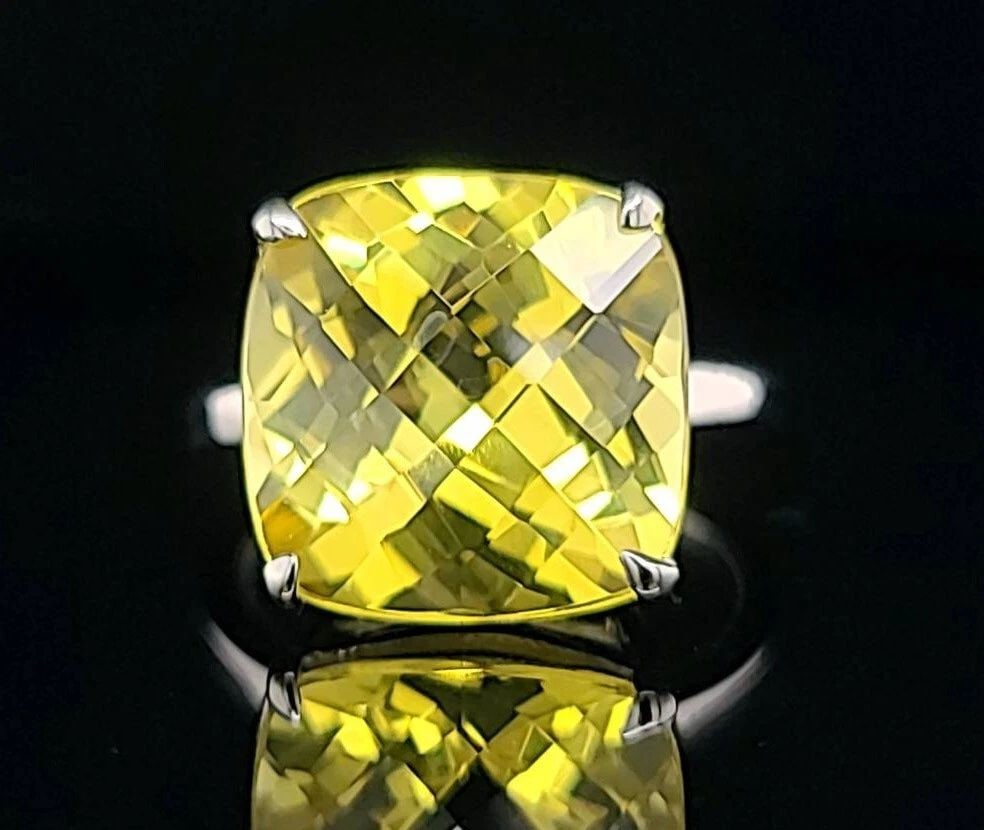 11.48CT. TIFFANY & CO 18K WHITE GOLD RING YELLOW SAPPHIRE CUSHION SHAPE: 11.48CT. TIFFANY & CO 18K WHITE GOLD RING YELLOW SAPPHIRE CUSHION SHAPE Tiffany & Co 11.48carat gem lab grown yellow sapphire set in 18k white gold ring cushion shape 13x13 weight 11.48ct. Gorgeous ye