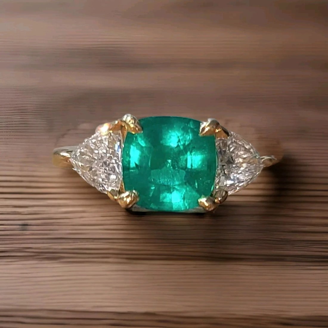 14K YELLOW GOLD ENGAGEMENT RING 1.08CT. NATURAL COLOMBIA EMERALD CUSHION GIA: 14K YELLOW GOLD ENGAGEMENT RING 1.08CT. NATURAL COLOMBIA EMERALD CUSHION GIA This stunning 14K yellow gold engagement ring showcases a beautiful 1.08CT natural Colombia emerald in a cushion shape, wit