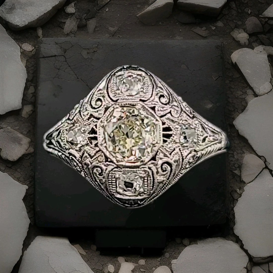 18K WHITE GOLD VINTAGE FILIGREE RING 0.82CT. NATURAL OLD MINE CUT DIAMOND 1920': 18K WHITE GOLD VINTAGE FILIGREE RING 0.82CT. NATURAL OLD MINE CUT DIAMOND 1920' This 18k White Gold Vintage Filigree ring features approx center weight of 0.82ct natural old mine cut diamond, SI1 clar
