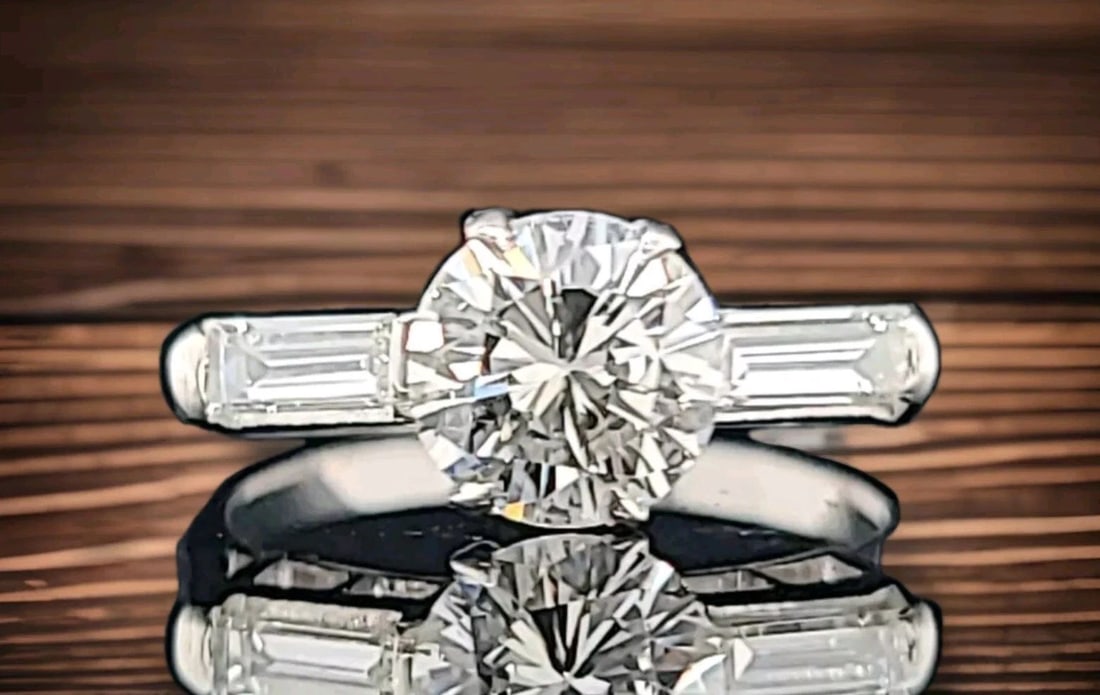 VINTAGE PLATINUM ENGAGEMENT RING 1.04CT.NATURAL ROUND CUT DIAMOND GIA CERT SI1: VINTAGE PLATINUM ENGAGEMENT RING 1.28CT.NATURAL ROUND CUT DIAMOND CIRC 1930'S This vintage platinum engagement ring features a stunning natural round cut diamond with a total weight of 1.28 carats. Th