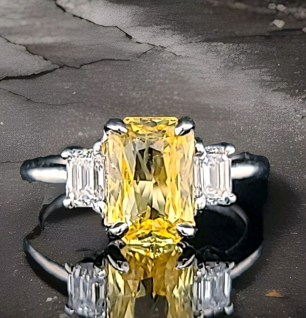 VINTAGE PLATINUM ENGAGEMENT RING 2.35CT.NATURAL YELLOW RADIANT SAPPHIRE GIA CERT: VINTAGE PLATINUM ENGAGEMENT RING 2.35CT.NATURAL YELLOW RADIANT SAPPHIRE GIA CERT Here is an outstanding natural yellow sapphire engagement ring, the beautiful three-stone yellow sapphire design gives