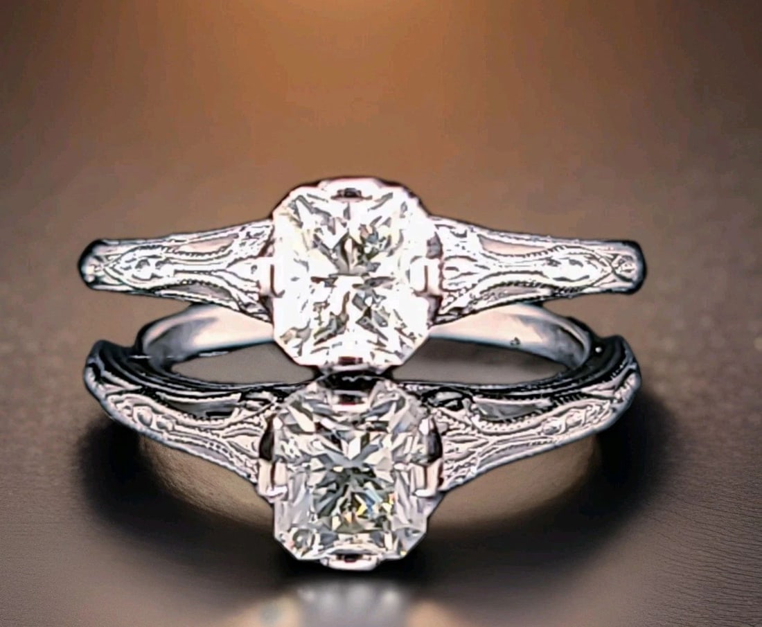 14K WHITE GOLD VINTAGE FILIGREE ENGAGEMENT RING 1.08CT. NATURAL RADIANT DIAMOND: 14K WHITE GOLD VINTAGE FILIGREE ENGAGEMENT RING 1.08CT. NATURAL RADIANT DIAMOND This 14k White Gold Vintage Filigree Engagement Ring features a beautiful 1.08CT natural radiant white diamond as the ma