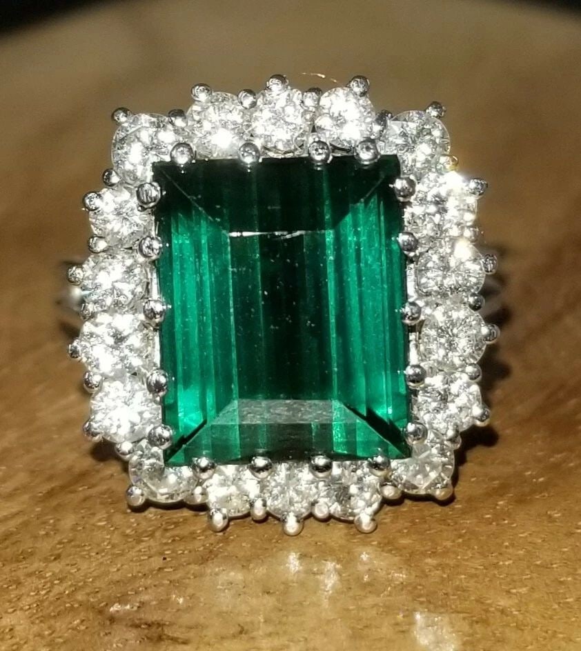 VINTAGE 14K WHITE GOLD RING 4.35CT. NATURAL GREEN TOURMALINE EMERALD SHAPE: VINTAGE 14K WHITE GOLD RING 4.35CT. NATURAL GREEN TOURMALINE EMERALD SHAPE GORGEOUS vintage 14K white gold ring natural green tourmaline in emerald shape center natural tourmaline weight 4.35ct. size