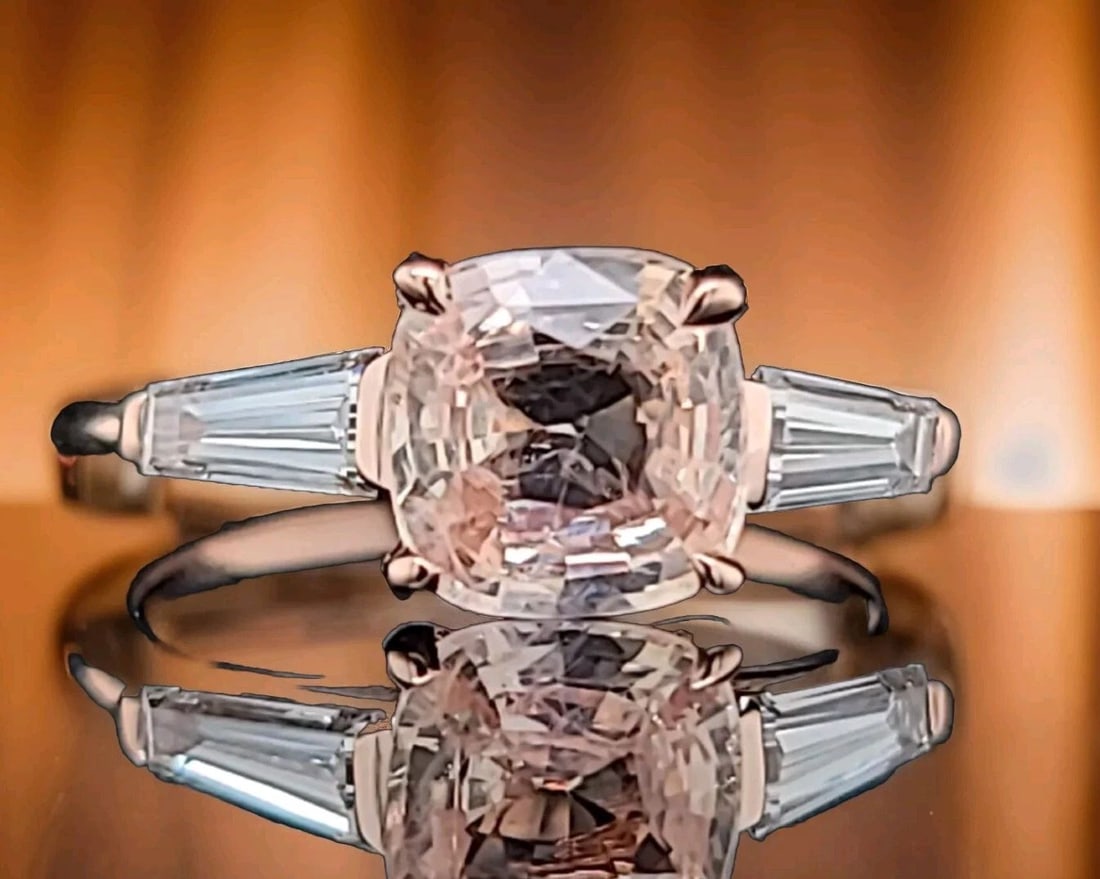 14K ROSE GOLD ENGAGEMENT RING 2.04CT. NATURAL PEACH SAPPHIRE CUSHION SHAPE GIA: 14K ROSE GOLD ENGAGEMENT RING 2.04CT. NATURAL PEACH SAPPHIRE CUSHION SHAPE GIA This stunning engagement ring is crafted from 14k rose gold and features a beautiful cushion-shaped natural peach sapphir