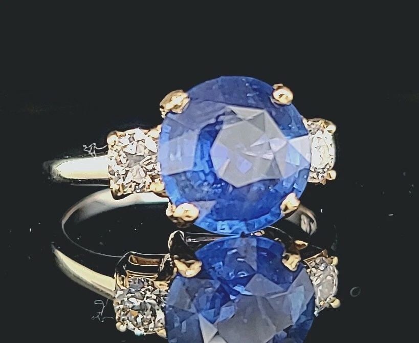 VINTAGE 14K GOLD ENGAGEMENT RING 3.65CT. NATURAL BLUE SAPPHIRE ROUND SHAPE: VINTAGE 14K GOLD ENGAGEMENT RING 3.65CT. NATURAL BLUE SAPPHIRE ROUND SHAPE VINTAGE 14k white & gold DIAMOND AND SAPPHIRE engagement RING CENTER NATURAL BLUE SAPPHIRE IN ROUND CUT WEIGHT 3.65CT SIZE 9.