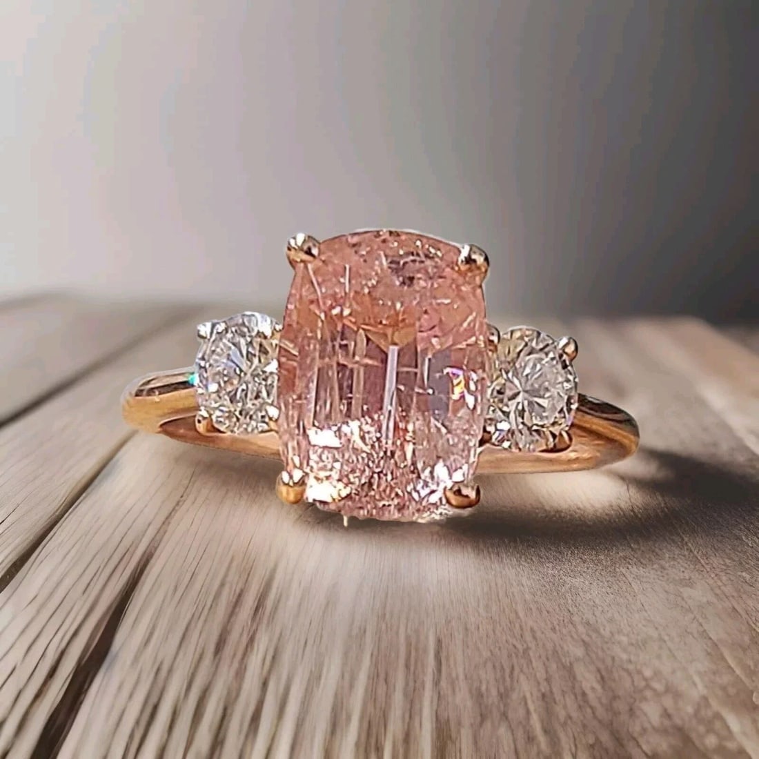 14K ROSE GOLD ENGAGEMENT RING 3.28CT. NATURAL PINK TOPAZ CUSHION SHAPE: 14K ROSE GOLD ENGAGEMENT RING 3.28CT. NATURAL PINK TOPAZ CUSHION SHAPE Gorgeous 14k rose gold engagement ring center natural untreated pink topaz cushion shape weight 3.28ct. Size 9.9x7.2mm GGI labora