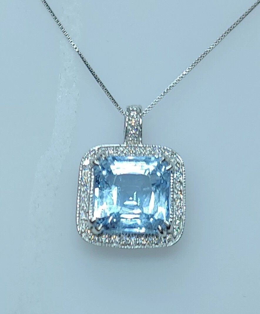 14K WHITE GOLD PENDANT 14.80CT. NATURAL SKY BLUE AQUAMARINE CUSHION SHAPE: 14K WHITE GOLD PENDANT 14.80CT. NATURAL SKY BLUE AQUAMARINE CUSHION SHAPE Gorgeous 14k white gold pendant natural blue aquamarine in radiant shape pendant 16 inch long. center natural aquamarine weigh