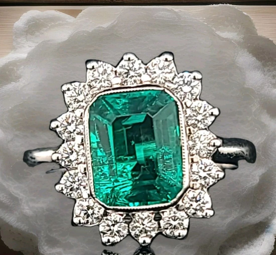 14K WHITE GOLD ENGAGEMENT RING 1.75CT. GEM GREEN EMERALD RECTANGULAR SHAPE: 14K WHITE GOLD ENGAGEMENT RING 1.75CT. GEM GREEN EMERALD RECTANGULAR SHAPE Gorgeous 14K WHITE GOLD ring Gem GREEN Colombia emerald. Center set Gem lab flux growth green Colombia emerald in emerald sha