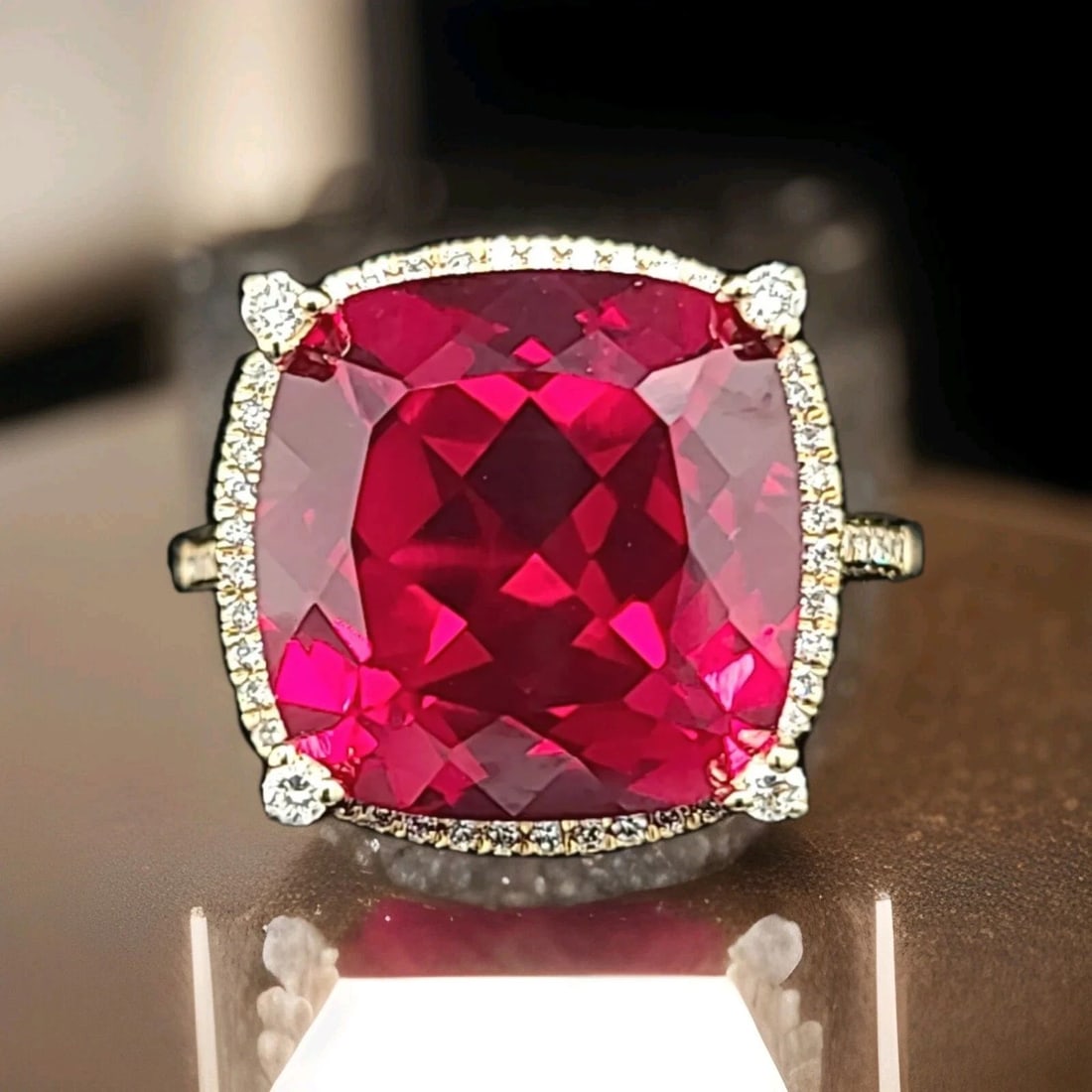 STUNNING 14K YELLOW GOLD ENGAGEMENT RING 14.87CT. LAB GROWN VIVID RUBY CUSHION: STUNNING 14K YELLOW GOLD ENGAGEMENT RING 14.87CT. GEM VIVID RUBY CUSHION SHAPE Gorgeous 14k yellow gold ruby ring, Center set lab-grown ruby in cushion cut ruby weight 14.87ct. Size 14x14 This ruby is