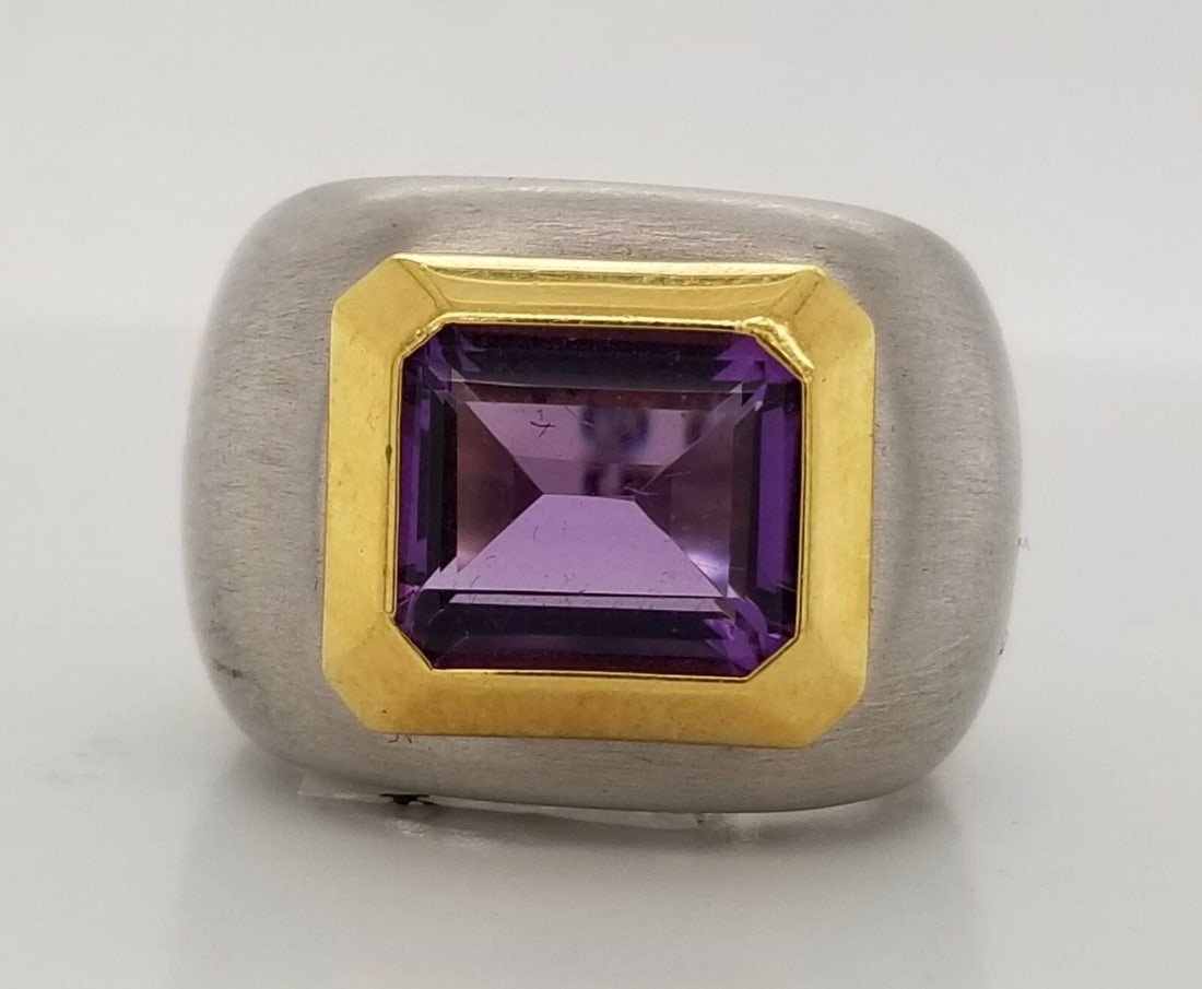 ITALIAN DESIGN 18K MULTI GOLD NATURAL AMETHYST RING 5.45CT IN EMERALD CUT: ITALIAN DESIGN 18K MULTI GOLD NATURAL AMETHYST RING 5.45CT IN EMERALD CUT GORGEOUS 18k multi tone GOLD natural amethyst ring Italian design. center natural amethyst in emerald shape weight 5.45ct size