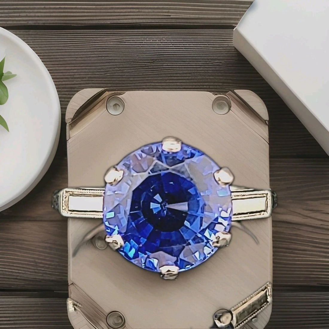 VINTAGE 18K WHITE GOLD ENGAGEMENT RING 4.35CT.LAB GROWN BLUE SAPPHIRE ROUND CUT: VINTAGE 18K WHITE GOLD ENGAGEMENT RING 4.35CT.NATURAL BLUE SAPPHIRE ROUND SHAPE This stunning vintage engagement ring features a round-shaped blue sapphire, set in 18kt white gold with a solitaire sty